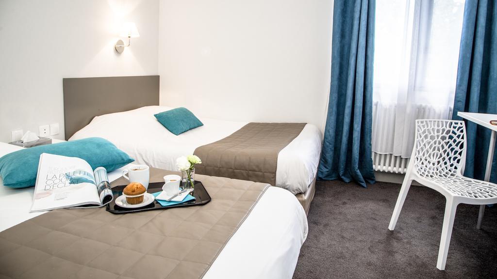 Hotel De La Pommeraie Le Mans Kültér fotó